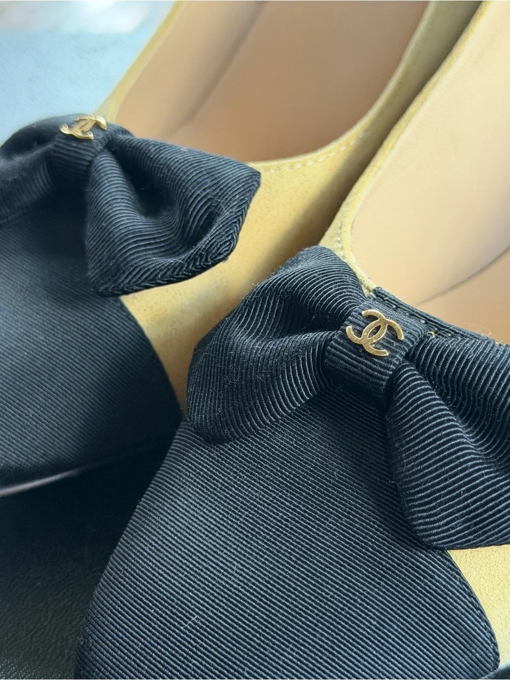 CHANEL Two-Tone Suede & Fabric Bow Pumps in Beige and Black